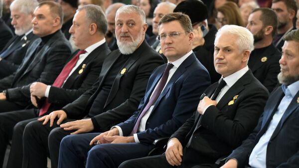 Адам Делимханов, Александр Новак и Муслим Хучиев на выставке-форум Россия