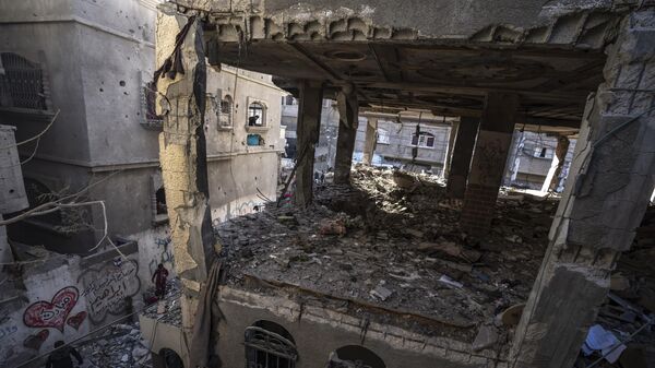 Дом, разрушенный в результате израильской бомбардировки сектора Газа