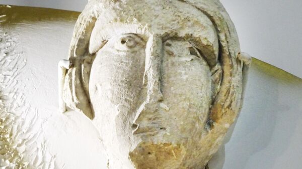 Исторический музей, женская маска из собора в Боголюбово (XII век)