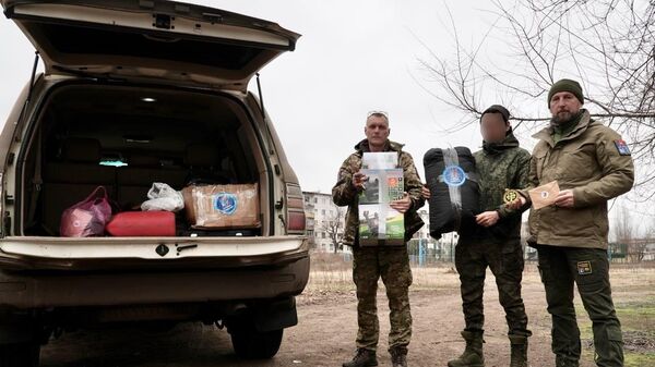 Передача бойцам в зоне СВО новогодних подарков из Магаданской области