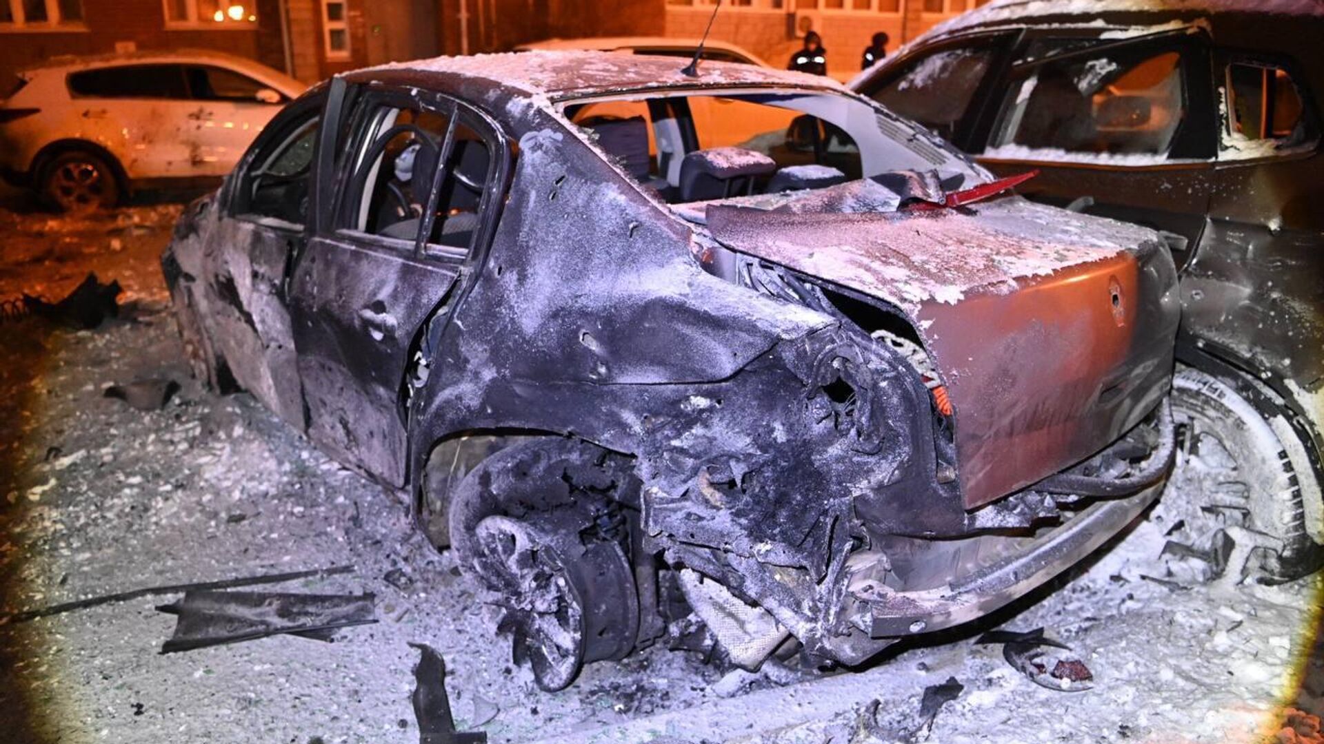Машина, поврежденная в результате обстрела Белгорода со стороны ВСУ - РИА Новости, 1920, 18.01.2024