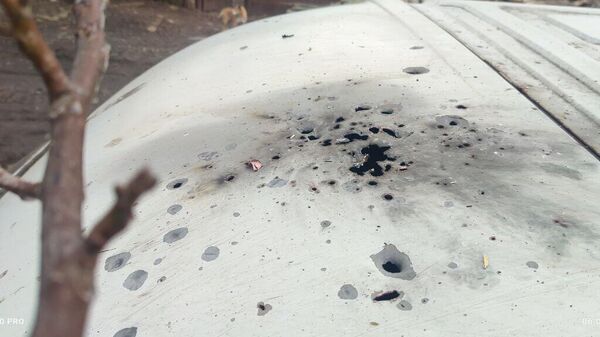 Автомобиль Газель, поврежденный в результате сброса взрывоопасного предмета с БПЛА ВФУ в Горловке. 6 января 2024