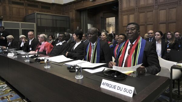 Представители делегации ЮАР во время открытия слушаний в Международном Суде в Гааге. 11 января 2024
