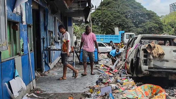 Последствия беспорядков в Порт-Морсби, Папуа — Новая Гвинея. Кадр видео