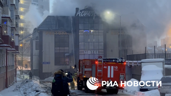 Место пожара в мини-отеле в Казани