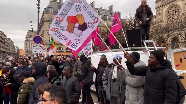 Акция в Париже против закона об ужесточении иммиграции