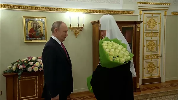 Путин на встрече с патриархом Кириллом по случаю 15-летия его интронизации