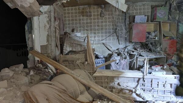 Жилой дом в Зимогорье Славяносербского района ЛНР, разрушенный в результате обстрела со стороны ВСУ