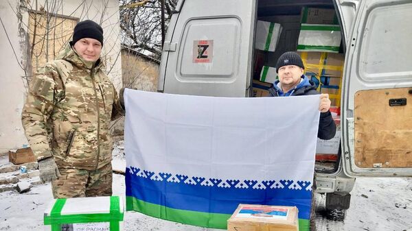 Два автомобиля, теплые вещи и консервы доставлены из Ненецкого округа бойцам СВО