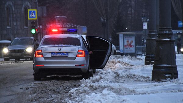 Автомобиль полиции на дороге в Москве