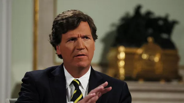 Американский журналист, основатель видеоплатформы Tucker Carlson Network Такер Карлсон во время интервью президента РФ Владимира Путина Американский журналист, основатель видеоплатформы Tucker Carlson Network Такер Карлсон во время интервью президента РФ Владимира Путина