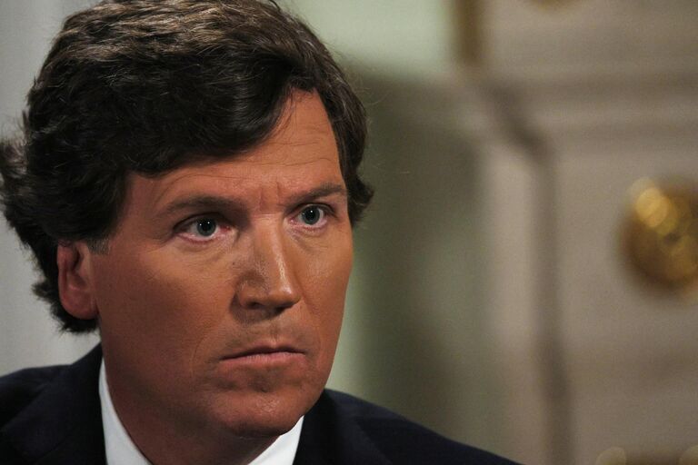 Американский журналист, основатель видеоплатформы Tucker Carlson Network Такер Карлсон во время интервью президента РФ Владимира Путина