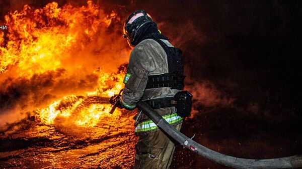 Пожарный на месте взрыва в Харькове