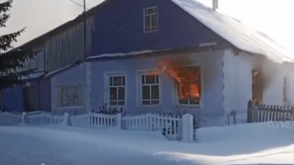 Место пожара в частном доме в селе Ильинском Свердловской области. 10 февраля 2024