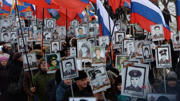 Участники акции Бессмертный батальон, посвященной Дню памяти воинов-интернационалистов, на Поклонной горе в Москве