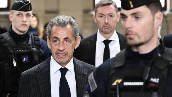 Бывший президент Франции Николя Саркози в здании суда в Париже. 14 февраля 2024