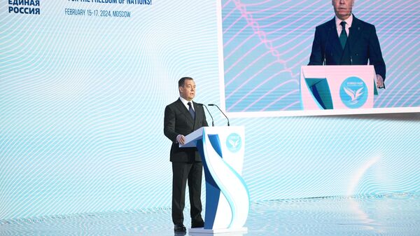 Заместитель председателя Совета безопасности РФ Дмитрий Медведев выступает на форуме сторонников борьбы с неоколониализмом За свободу наций в Москве