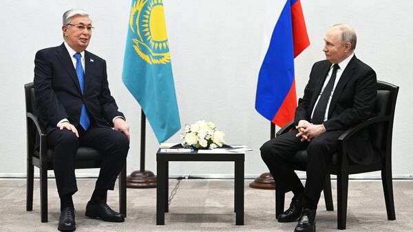 Президент России Владимир Путин и президент Республики Казахстан Касым-Жомарт Токаев во время встречи в Казани