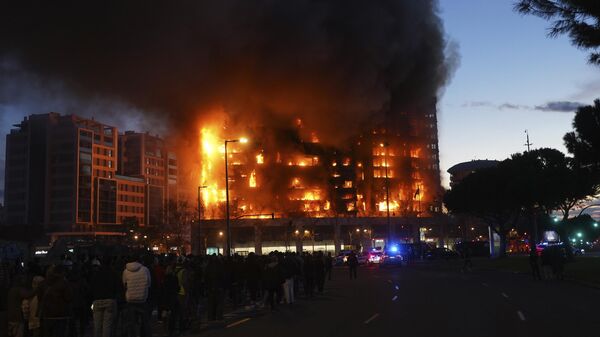 Место пожара в многоквартирном доме в Валенсии в Испании. 22 февраля 2024