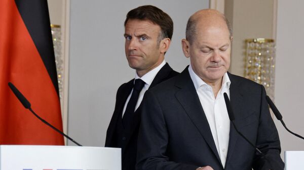 Канцлер Германии Олаф Шольц и президент Франции Эммануэль Макрон