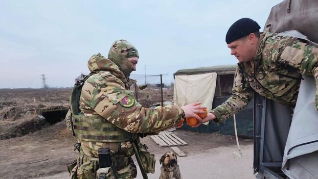 Передача гуманитарной помощи бойцам СВО от казаков Кубани