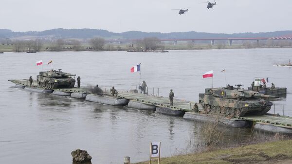 Военнослужащие Польши и других стран НАТО во время учений Steadfast Defender 24 в Корженево