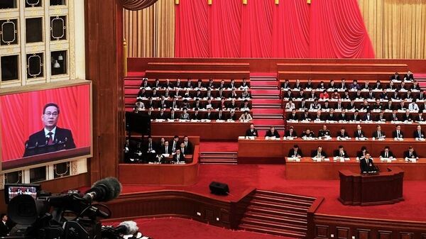 Премьер Государственного совета КНР Ли Цян выступает на второй сессии Всекитайского собрания народных представителей 14-го созыва в Доме народных собраний в Пекине. 5 марта 2024