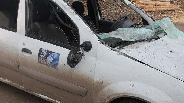 Автомобиль Луганской телефонной компании после атаки украинского дрона-камикадзе в ЛНР. 5 марта 2024