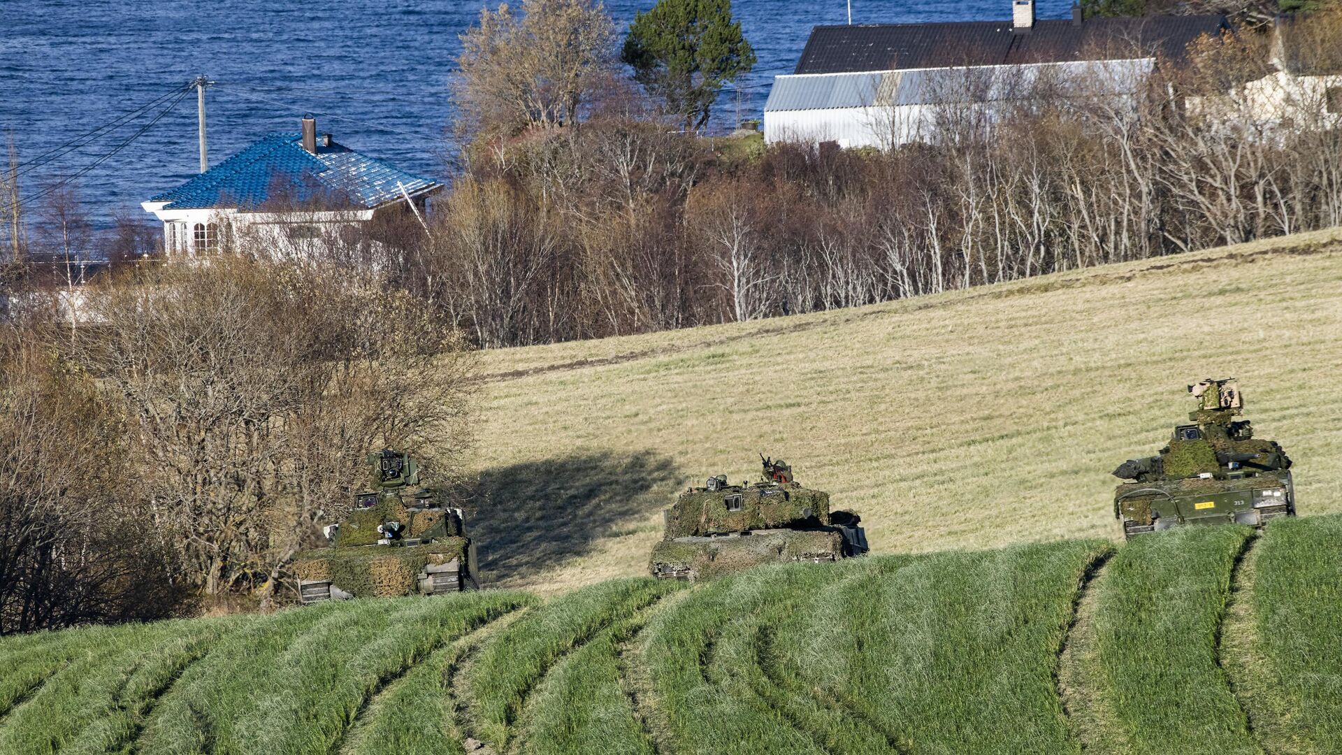 Танки норвежских и немецких войск во время учений НАТО Trident Juncture 2018 в Норвегии - РИА Новости, 1920, 06.03.2024