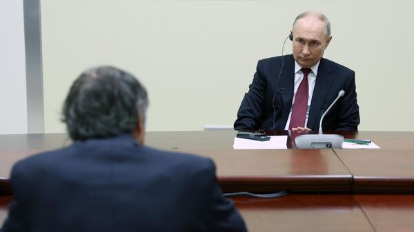 Президент России Владимир Путин во время встречи с генеральным директором Международного агентства по атомной энергии Рафаэлем Гросси