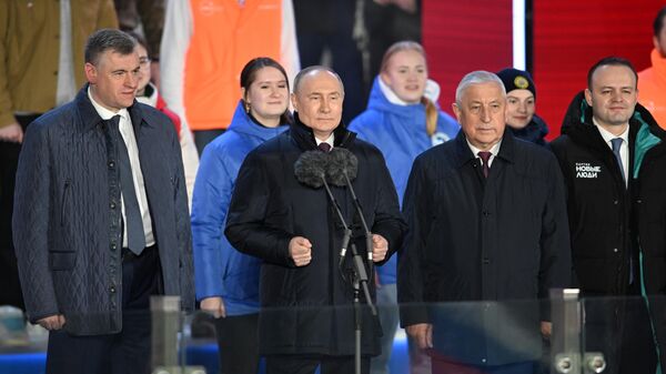 Президент РФ Владимир Путин на митинге-концерте на Красной площади в Москве, посвященном десятилетию воссоединения Крыма с Россией
