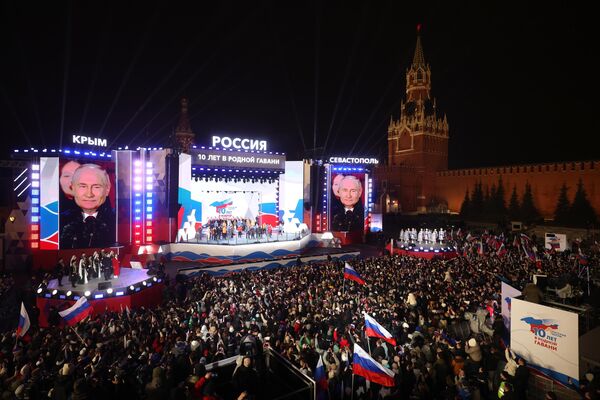 Президент РФ Владимир Путин на митинг-концерте на Красной площади в Москве, посвященном десятилетию воссоединения Крыма с Россией