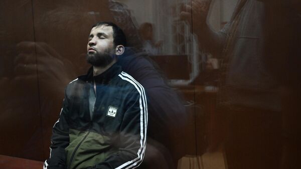 Фаридуни Шамсидин, задержанный по подозрению в террористическом акте в Крокус Сити Холл, в здании Басманного суда Москвы. Архивное фото