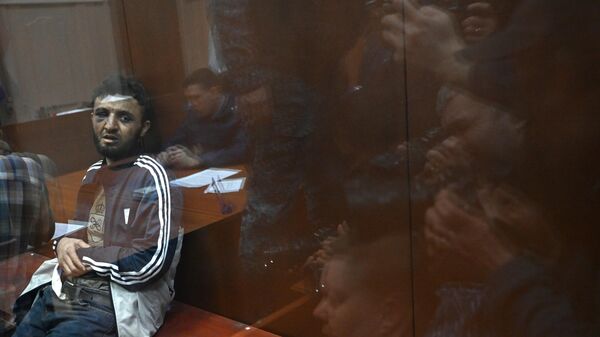 Далержон Мирзоев*, задержанный по подозрению в террористическом акте в Крокус Сити Холл, в здании Басманного суда Москвы