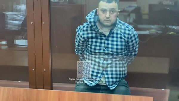 Аминчон Исломов, задержанный по подозрению в террористическом акте в Крокус Сити Холл, в здании Басманного суда Москвы