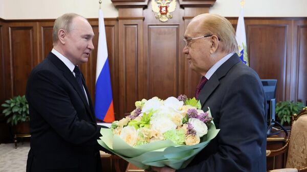 Президент РФ Владимир Путин и ректор МГУ Виктор Садовничий во время встречи. 3 апреля 2024