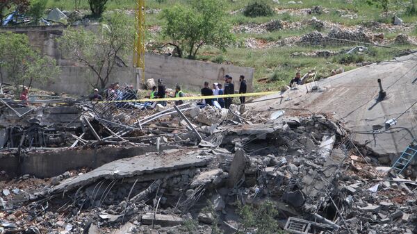 Разрушенное после израильского авиаудара здание в Ливане