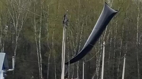 Метеозонд со взрывчатой в Тарусском районе Калужской области. Кадр видео