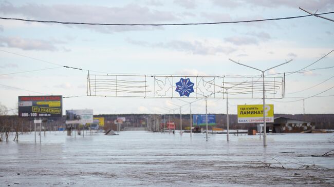 Подтопленное шоссе Тюнина в городе Кургане