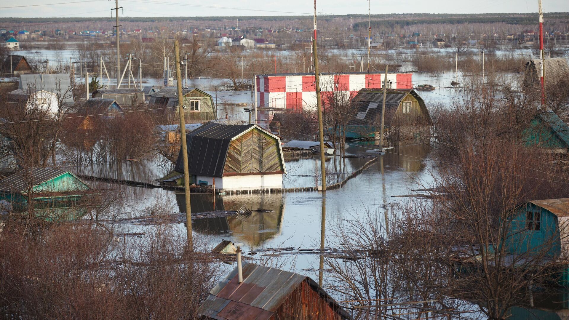 Подтопленные дома в городе Кургане - РИА Новости, 1920, 24.04.2024