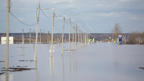 Паводок в окрестностях шоссе Тюнина в городе Кургане Паводок в окрестностях шоссе Тюнина в городе Кургане