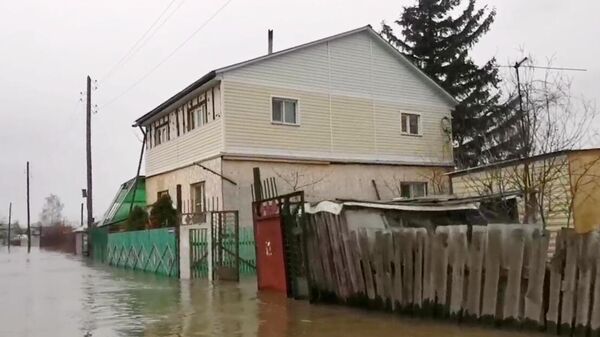 Затопленный вследствие паводка микрорайон Вороновка в Кургане. Стоп-кадр видео