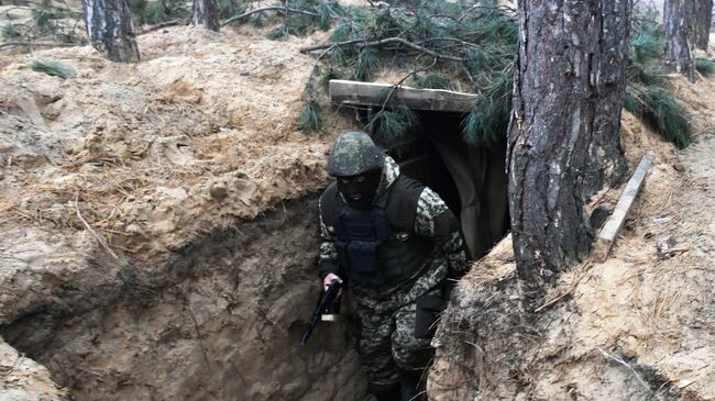 Военнослужащий на позиции в зоне СВО 