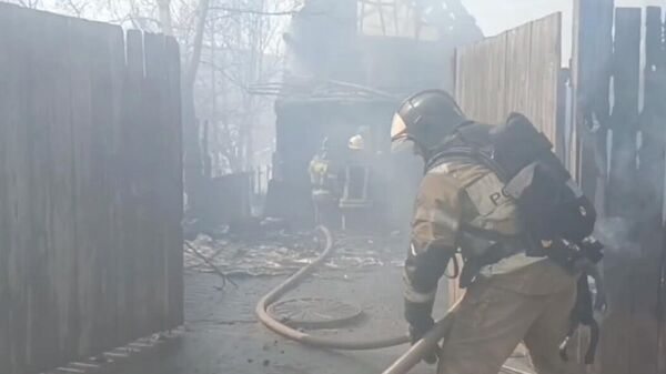 Место пожара по улице Стасовой в Красноярске. 27 апреля 2024