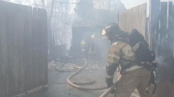 Место пожара по улице Стасовой в Красноярске. 27 апреля 2024