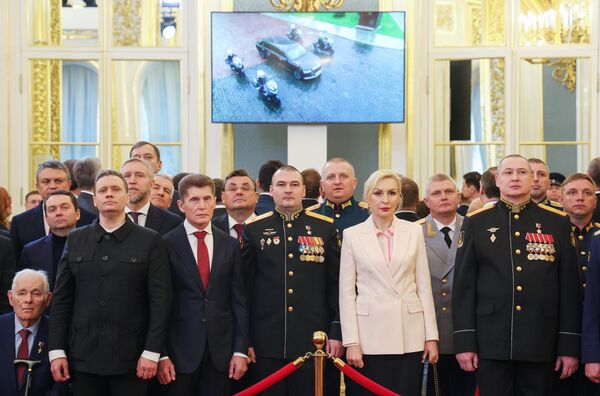 Гости перед церемонией инаугурации президента РФ Владимира Путина в Кремле.