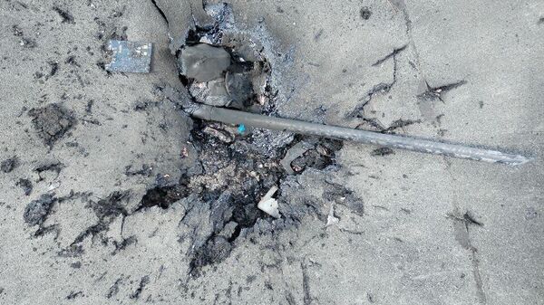 Место падения украинского дрона на маслодельном комбинате в Судже