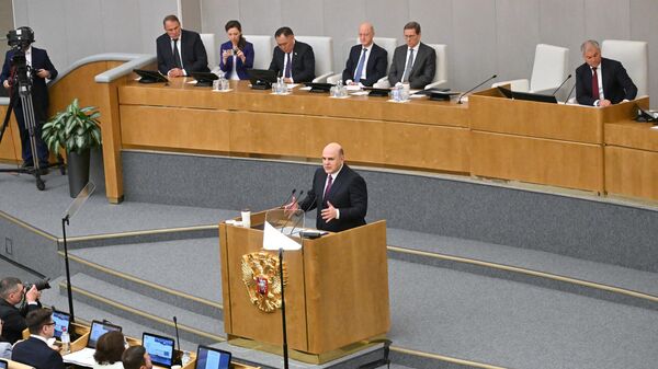 Кандидат на пост председателя правительства РФ Михаил Мишустин выступает на пленарном заседании Государственной Думы РФ