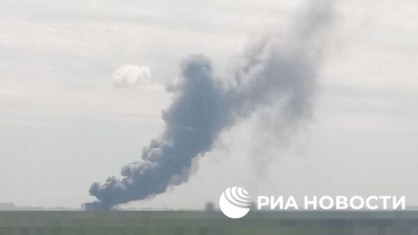 Дым на месте удара в Николаеве. 15 мая 2024