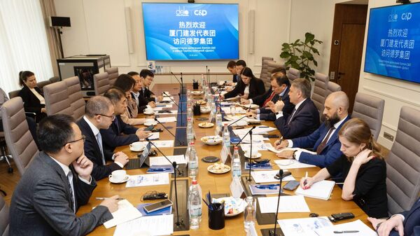 Председатель Совета директоров ГК Дело Сергей Шишкарев и генеральный директор Xiamen C&D Inc. Лин Мао договорились о выстраивании совместных логистических цепочек